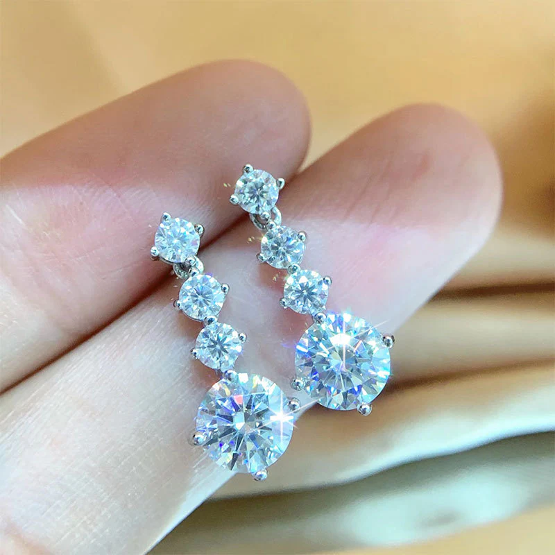 Understated Luxury Four Prong Drop Earrings - Image 4